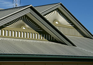 What type of gutters work well on metal roofs?